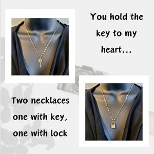 Set of two gold plated wave necklaces, lock and key pendants 17" plus 2" length